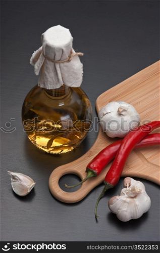 garlic and red chili peppers on the kitchen table