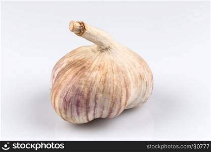 Garlic bulb closeup isolated on white background
