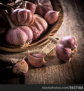 garlic bulb on rustic wooden background