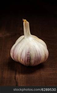 Garlic bulb on wooden background