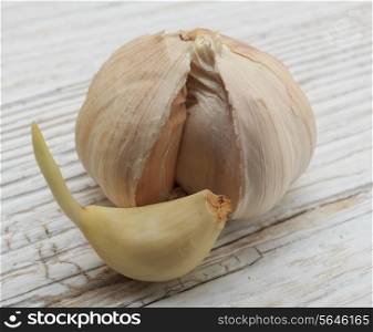 Garlic on a white wooden board