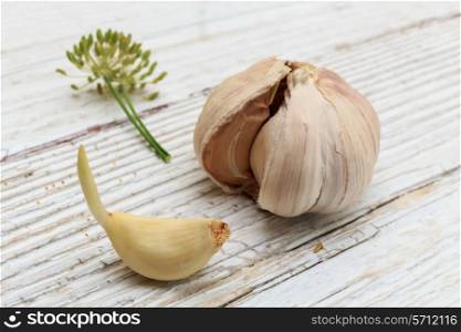 Garlic on a white wooden board
