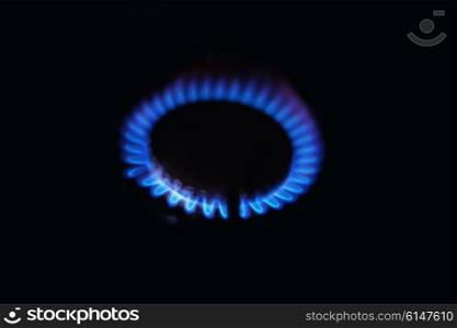 Gas burners, burning in the dark blue flames