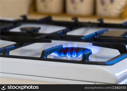 Gas burning in the burner of gas stove, gas shortage and crisis. gas burner, shortage
