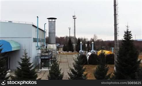 gas compressor station in late autumn, panorama right to left