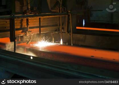 Gas cutting of the hot metal inside of plant