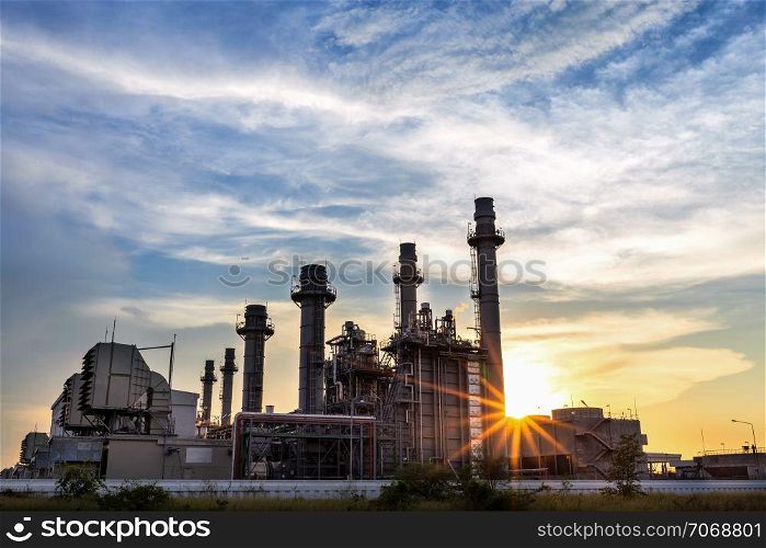 Gas turbine electric power plant with sunset is support all factory in industrial estate Chonburi city
