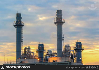 Gas turbine electrical power plant at dusk with twilight support all factory