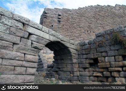 Gate and wall of fortress in Assos, Turkey