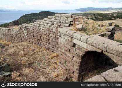 Gate and wall of fortress in Assos, Turkey