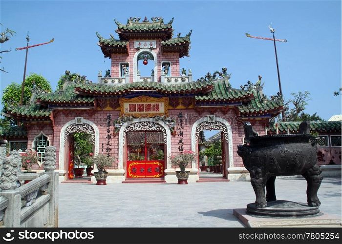 Gate of old vietnamise temple in city Hoian in Vietnam