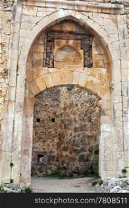 Gate of stone wall of castle in Alanya Turkley