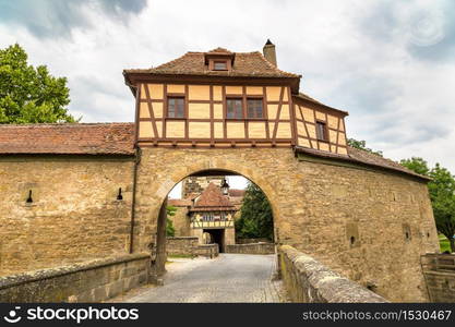 Gate to the old city Rothenburg in a beautiful summer day, Germany