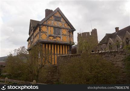 Gatehouse entrance to Stokesay castle on a dark cloudy day