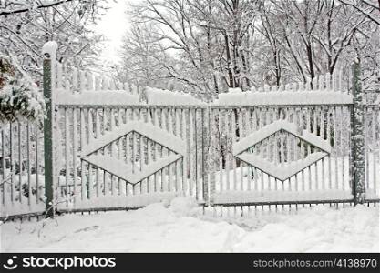 Gates covered with snow on winter season