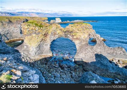 Gatklettur natural arch along the ocean, Arnarstapi, Iceland.