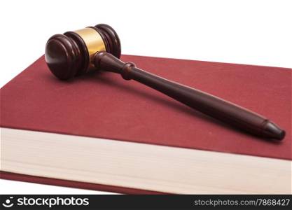Gavel and book on white background