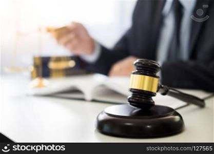 gavel and soundblock of justice law and lawyer working on wooden desk background. gavel and soundblock of justice law and lawyer working on wooden