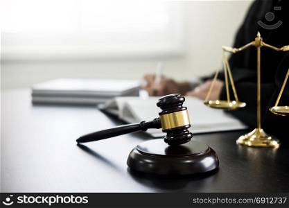 gavel and soundblock of justice law and lawyer working on wooden desk background