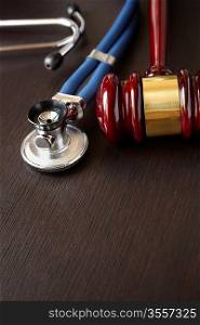Gavel and Stethoscope , selective focus on nearest part
