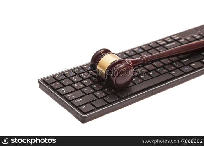 Gavel on black computer keyboard