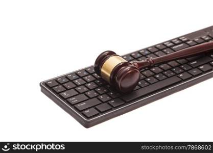 Gavel on black computer keyboard