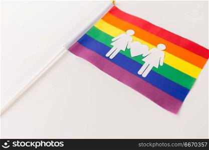 gay pride, homosexual and lgbt concept - rainbow flag with female couple white paper pictogram. rainbow flag with female couple white pictogram. rainbow flag with female couple white pictogram