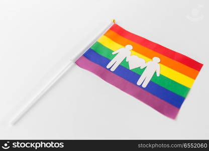 gay pride, homosexual and lgbt concept - rainbow flag with male couple white paper pictogram. rainbow flag with male couple white pictogram. rainbow flag with male couple white pictogram