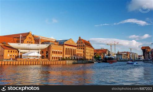 Gdansk, Poland - June 26, 2018: Panoramic view of the old city of Gdansk on the Motlawa River and famous The Polish Baltic Philharmonic.