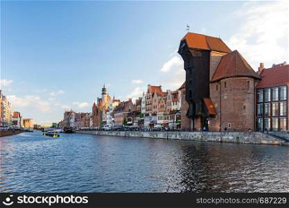 Gdansk, Poland - June 26, 2018: View of the old city of Gdansk on the Motlawa River and famous medieval port crane.