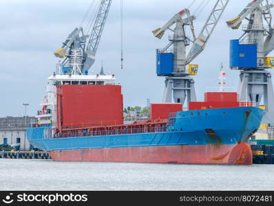 Gdansk. Sea port.. Large cranes on a pier in the seaport of Gdansk.