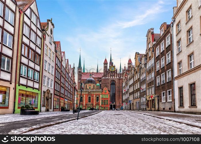 Gdansk street and the Royal chapel view in winter, Poland.. Gdansk street and the Royal chapel view in winter, Poland