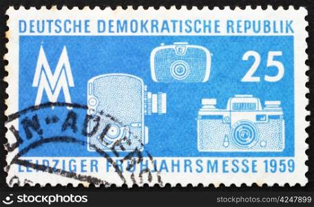 GDR - CIRCA 1959: a stamp printed in GDR shows Photographic Equipment, Leipzig Spring Fair, circa 1959