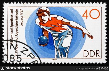 GDR - CIRCA 1987: a stamp printed in GDR shows Bowling, 11th Children&rsquo;s and Youths&rsquo; Spartakiade, circa 1987