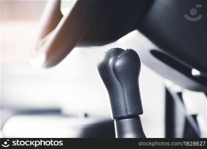 Gear lever isolated in the car with sunlight