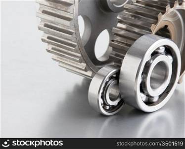 gears and bearings on a metal plate
