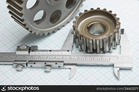 gears and caliper on graph paper