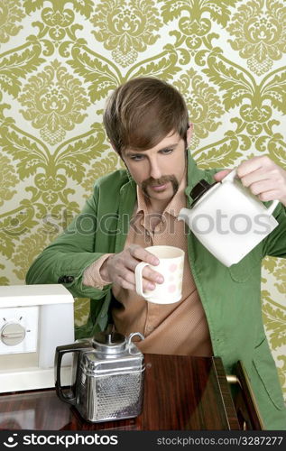 geek retro man drinking tea coffee vintage teapot in wallpaper