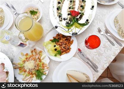 gefilte fish and other snacks on festive table