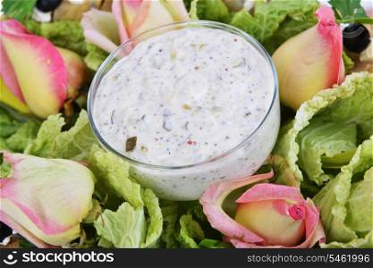 gefilte fish decorated with greenery and flowers