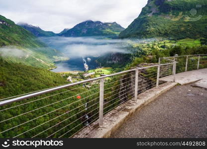 Geiranger fjord, Beautiful Nature Norway panorama. It is a 15-kilometre (9.3 mi) long branch off of the Sunnylvsfjorden, which is a branch off of the Storfjorden (Great Fjord).