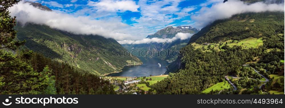 Geiranger fjord, Beautiful Nature Norway panorama. It is a 15-kilometre (9.3 mi) long branch off of the Sunnylvsfjorden, which is a branch off of the Storfjorden (Great Fjord).