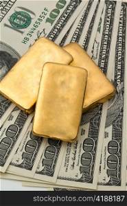 Geldanlage in echtem Gold als Goldbarren und Goldmunzen