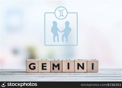 Gemini star sign on a wooden table