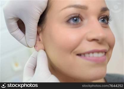 general practitioner working with inner ear