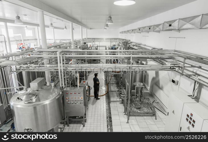 general view of the interior of a milk factory. equipment at the dairy plant. equipment at the milk factory