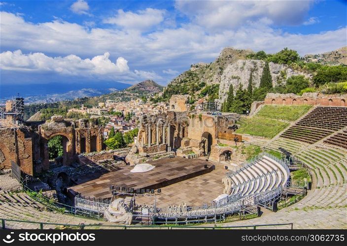 General view of the taormina theater the city of taormina and Sicilian territory background
