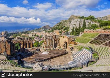 General view of the taormina theater the city of taormina and Sicilian territory background