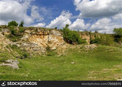 General view toward sedimentary rock in the field, Ludogorie, Bulgaria