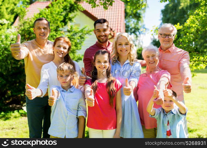 generation and people concept - happy family portrait in summer garden. happy family portrait in summer garden